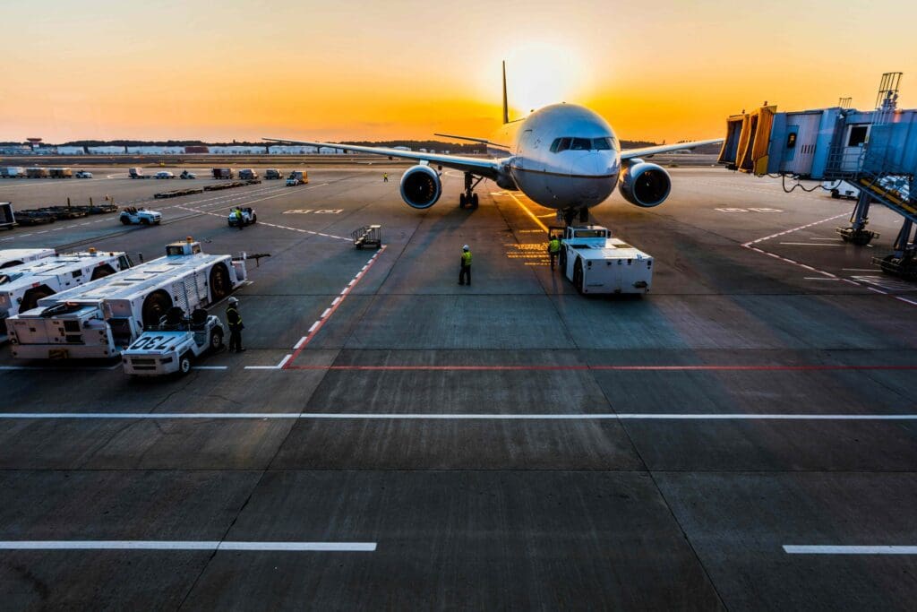 Plane at an aiport Flying to your cruise destination opens up a broader range of cruise opportunities